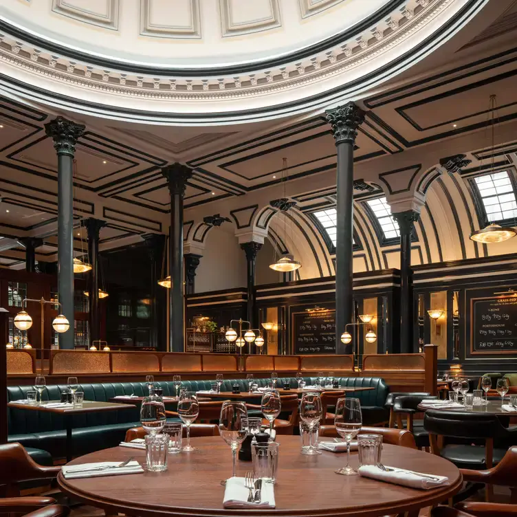 The high-ceilinged elegant dining room at Hawksmoor Dublin.