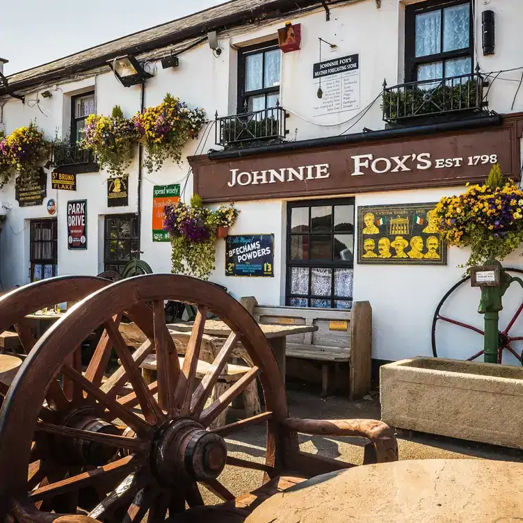 The quirky flower-filled facade at Johnny Fox’s, one of the best pubs near Dublin.