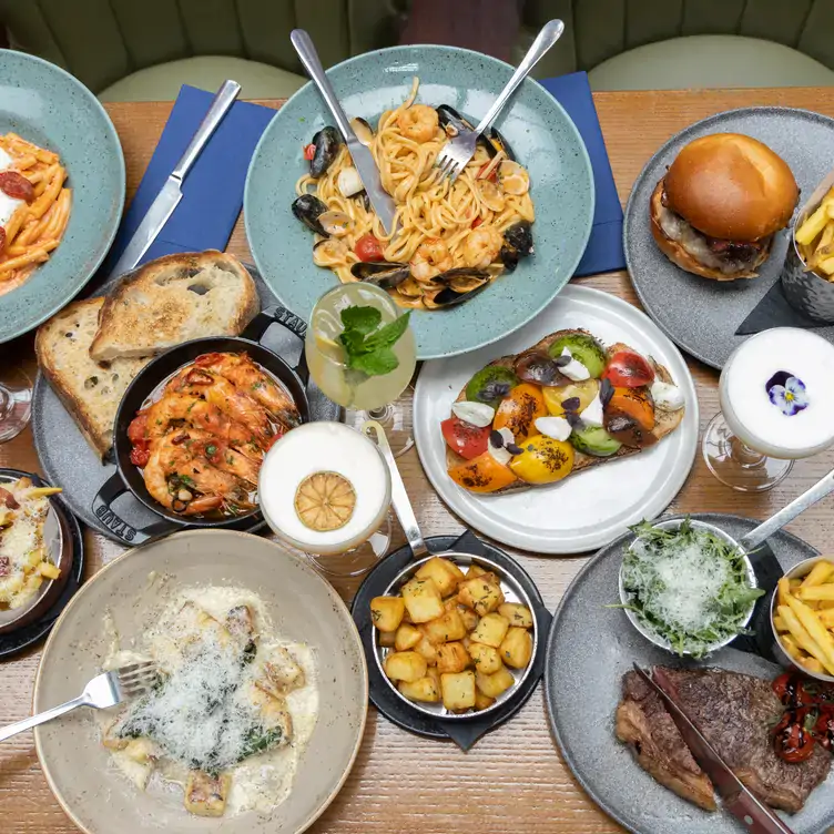 A spread of dishes featuring pasta, burgers and more at NoLita, a restaurant in Dublin