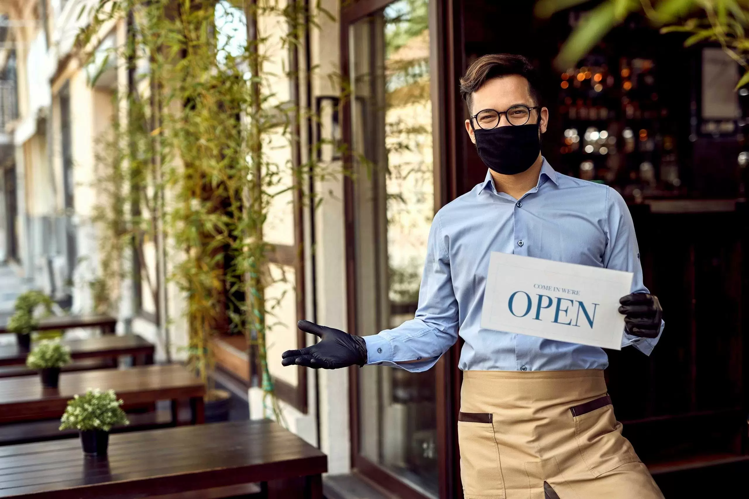 friendly waiter greeting